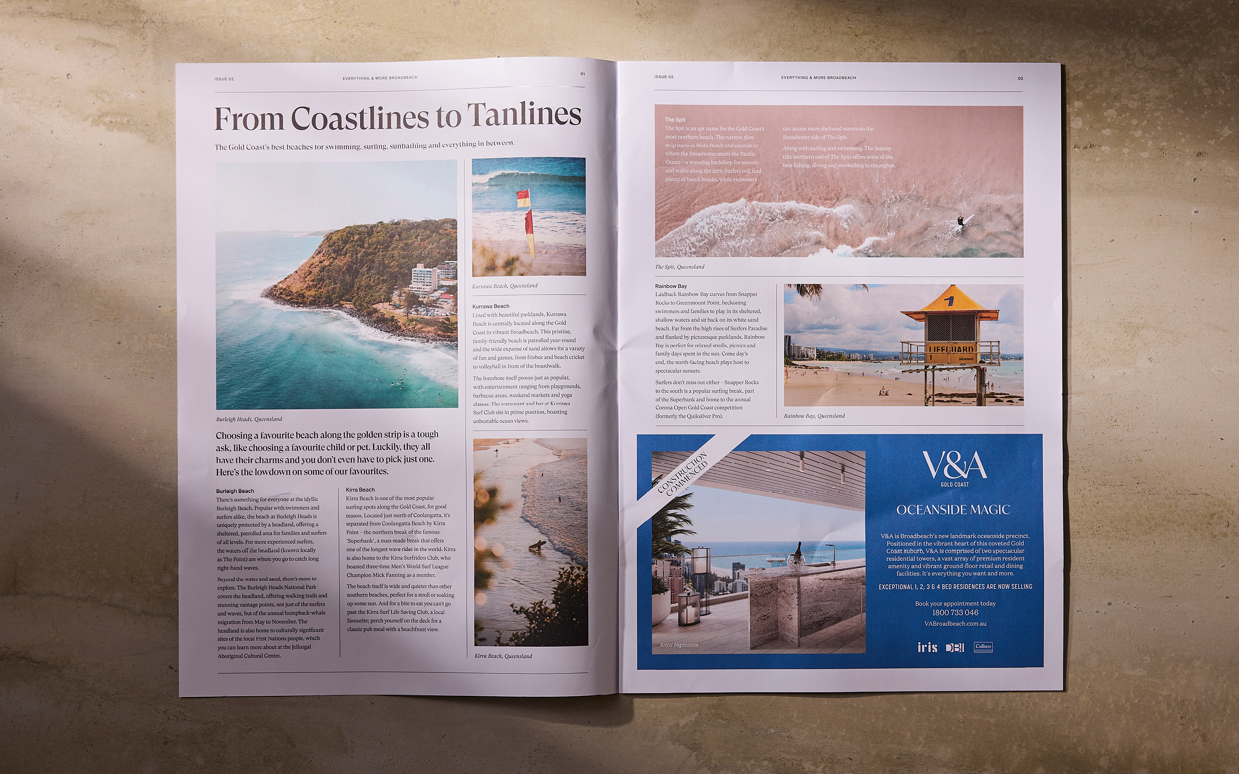 Open double page spread of the V&A broadsheet on best beaches on the Gold Coast